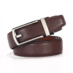 Detail of coffee brown leather belt with Saffiano texture and silver automatic buckle