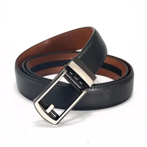 Macro shot of black Saffiano leather belt with brushed silver automatic metal buckle