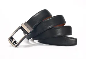 Detail of premium black leather belt with gunmetal brushed buckle and Saffiano texture