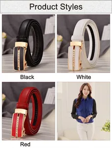Detail of automatic buckle leather belts in black, white, and red with rhinestone accents