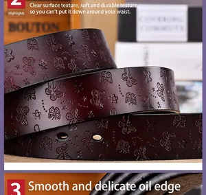 Détails de ceinture en cuir bordeaux avec motifs de papillons embossés et bords nets