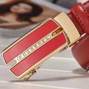 Elegant red leather belt for women with a sparkling gold automatic rhinestone buckle