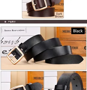Detail showing classic black and dark brown leather belts with elegant gold square buckles