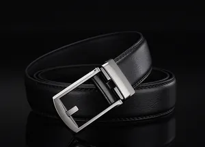 Detail of black lychee grain leather belt with brushed silver metal automatic buckle
