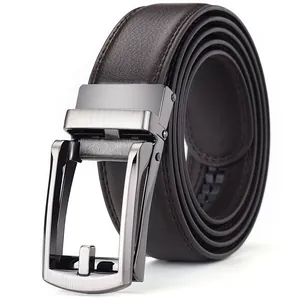 Detail of men's belt featuring a brushed metal automatic buckle and textured brown strap
