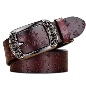 Ceinture femme en cuir rouge vin avec gaufrage papillon et boucle florale argentée