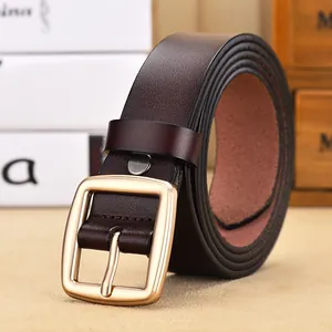 Brown leather women's belt featuring a minimalist golden pin buckle for casual jeans