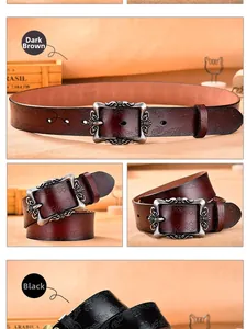 Detail of vintage floral embossed leather belts with baroque carved metal buckle set