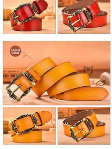 Detail of embossed floral patterns and bronze baroque buckle on vintage leather belts