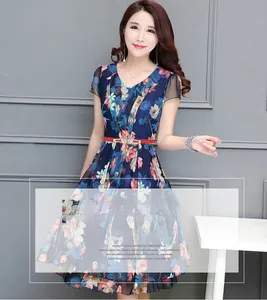 Detail of a floral V-neck dress with a stylish thin red waist belt for women