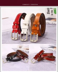 Detailed display of colorful leather belts with silver buckles in five vibrant shades