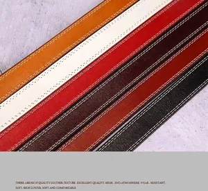 Detail of genuine cowhide leather belts with smooth finish and premium double-row stitching