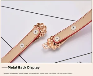 Macro detail of rose gold petal buckle back with secure screws on beige leather belt