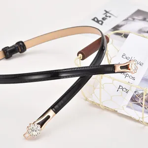 Elegant thin black patent leather belt for women with golden rhinestone flower buckle