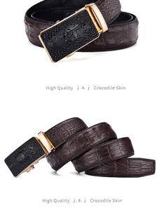 Detailed close-up of dark brown crocodile pattern leather belt with golden automatic buckle