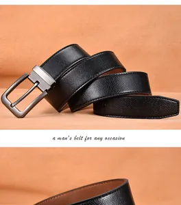 Detail view of black crossgrain leather belt with silver-grey square pin buckle for men