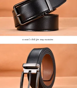 Detail of classic black leather belt with matte grey buckle and textured brown lining