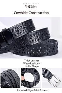 Macro detail of black leather belt with hollow flower laser cut and silver buckle