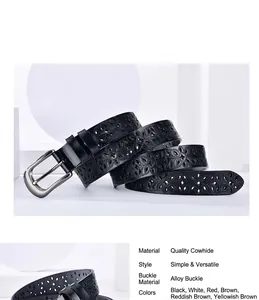 Macro detail of black genuine cowhide leather belt with floral hollow-out pattern
