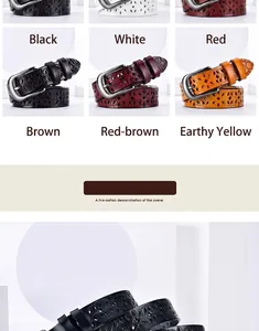 Detailed close-up of hollow floral patterns and metal pin buckle on women's leather belt