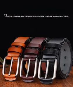 Detail view of men leather belts in three colors with brushed metal pin buckles