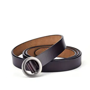 Minimalist dark brown leather belt for women featuring a vintage round metal buckle
