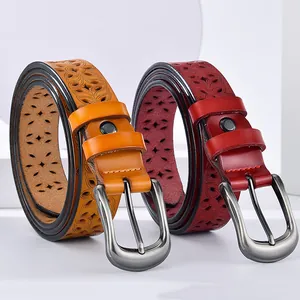 Women's slim leather belts in orange and wine red with floral hollow patterns