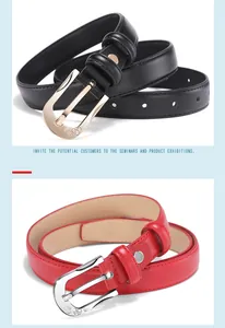 Detail of thin leather belts with rhinestone heart buckles in black and red colors