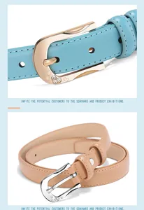 Detail view of heart-shaped metal buckles with rhinestones on slim leather belts