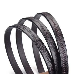 Slim genuine leather waist belt for women with elegant zigzag stitching detail