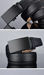 Detail of men's black automatic buckle belt with carbon fiber texture on reflective surface