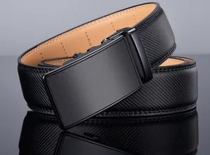 Macro shot of men's matte black automatic buckle belt with carbon fiber texture leather