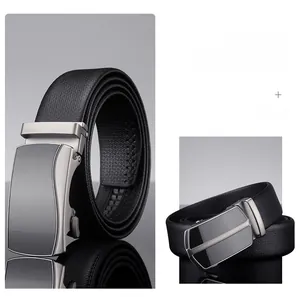 Detail of premium black leather belt with brushed alloy automatic buckle for men