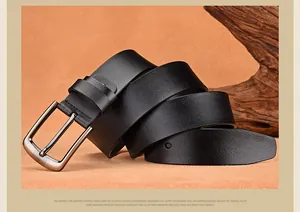 Close-up of vintage black cowhide leather belt with brushed alloy pin buckle detail