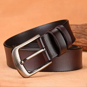 Men's vintage dark brown leather belt with silver pin buckle and textured metal finish