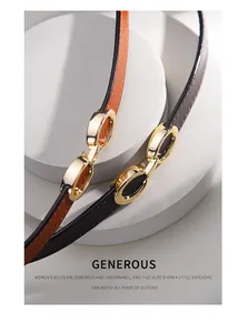 Detail of genuine leather skinny belts featuring gold double oval metal buckles in two colors