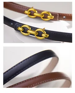 Macro view of slender leather belt showing gold chain buckle and fine stitching details