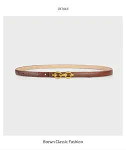Detailed close-up of brown leather waist belt with golden double ring metal buckle