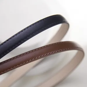 Minimalist slim leather belt for dresses in black and brown with fine edge stitching
