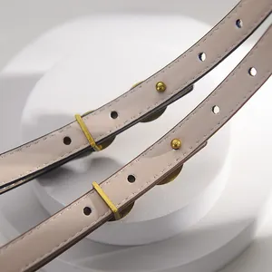 Slim nude leather belt for women with elegant gold metal buckle and smooth finish
