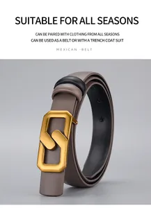 Close-up of elegant taupe leather belt with golden interlocking geometric metal buckle