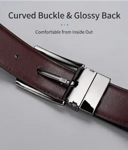 Detail of men's leather belt featuring a polished silver buckle and lychee texture
