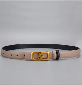 Detail of beige leather belt with unique gold geometric double octagon buckle for women