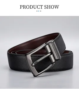 Detail of men's leather belt with twill texture and polished gunmetal pin buckle
