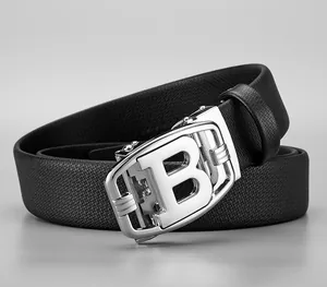 Close-up of black leather belt with silver letter B automatic buckle for men