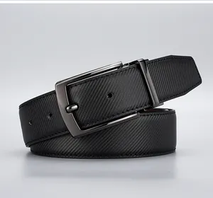 Close-up of black men's business leather belt with carbon fiber texture and gunmetal pin buckle