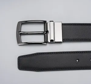 Detailed view of black textured leather belt featuring a polished metal pin buckle