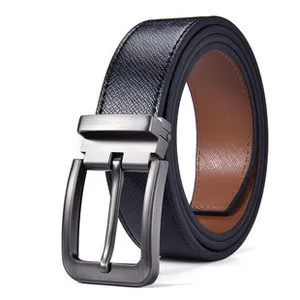 Detail view of double-sided leather belt with black Saffiano texture and gunmetal buckle