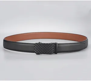 Detail of men's leather belt featuring black grid texture and metal automatic buckle