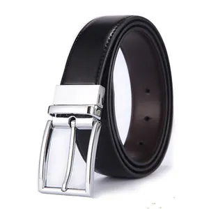 Detail shot of silver metal pin buckle and polished black stretch woven belt strap